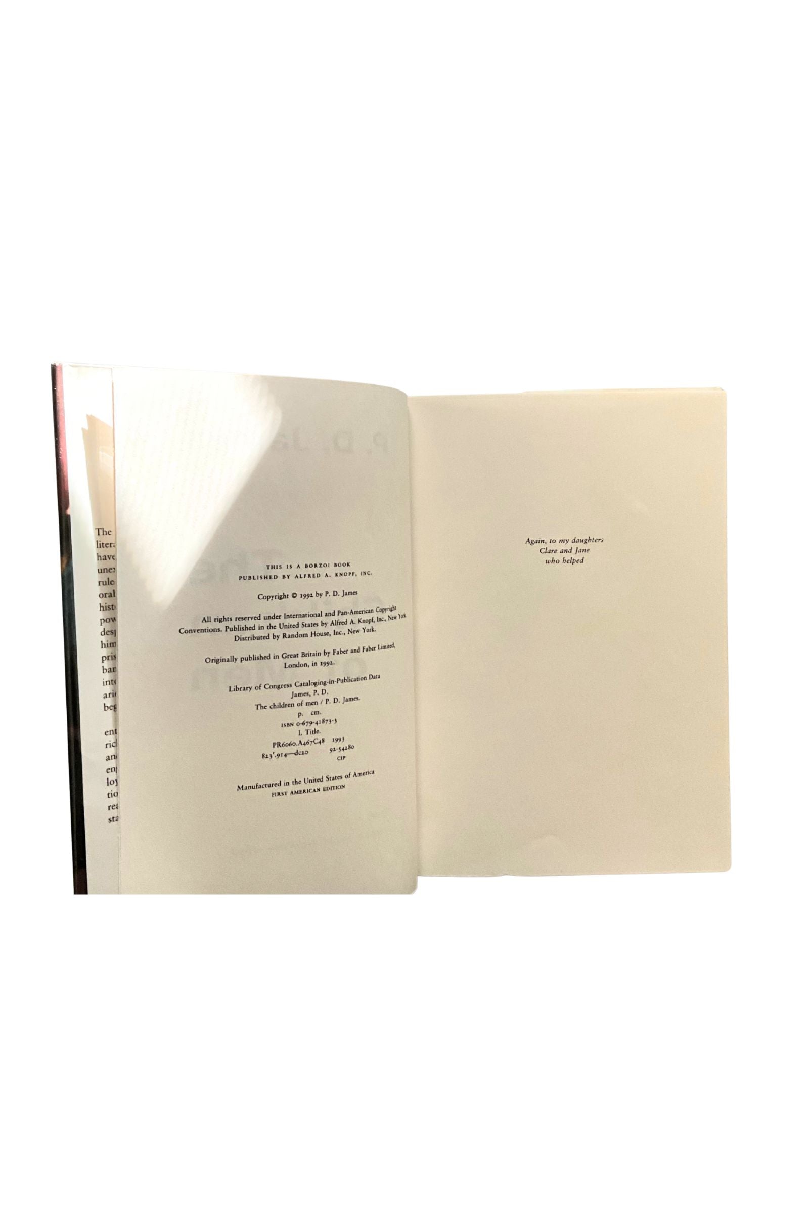 Open book showing copyright information, on a white background
