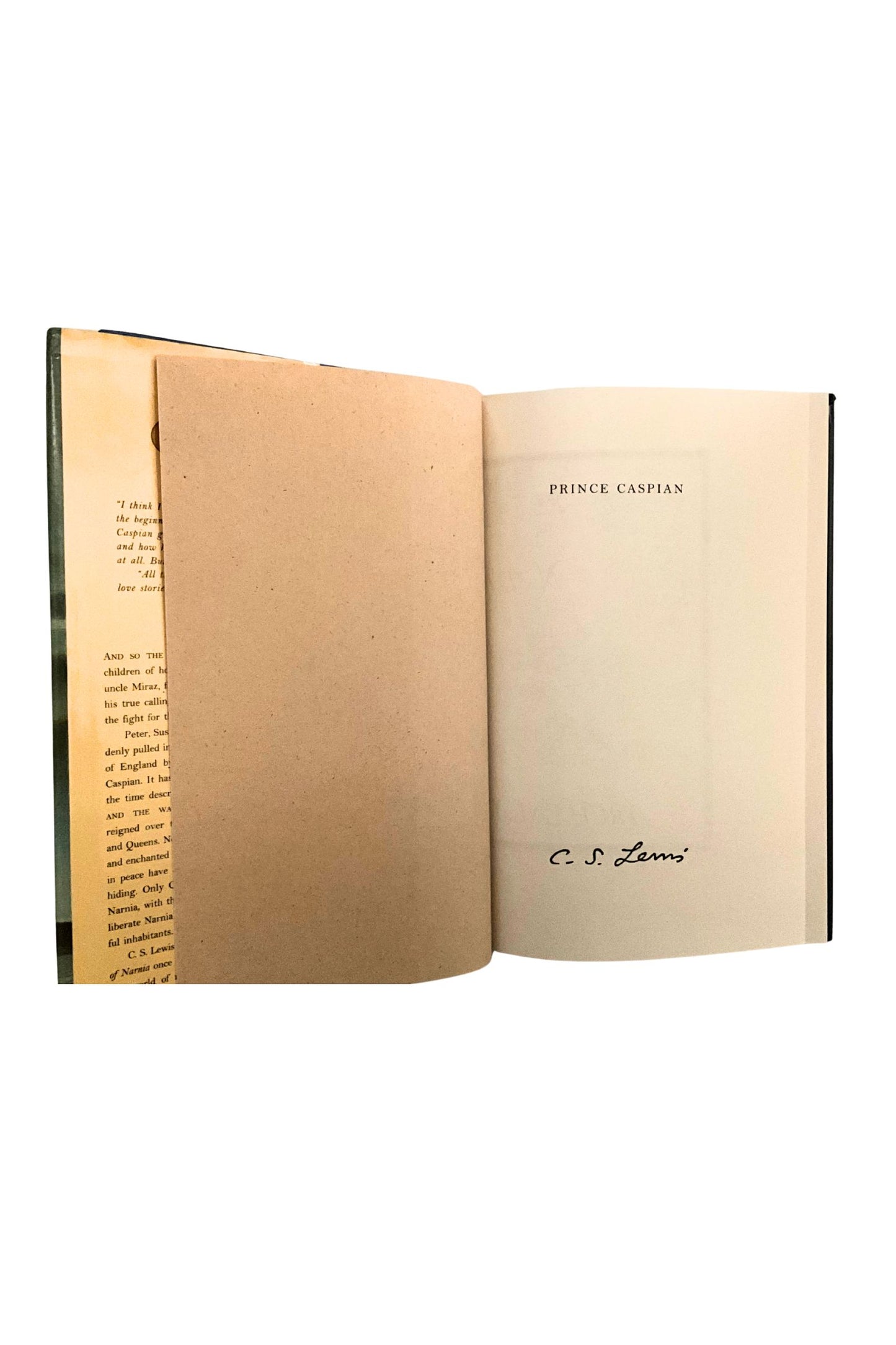 Book opened to the first page which shows the signature of CS Lewis